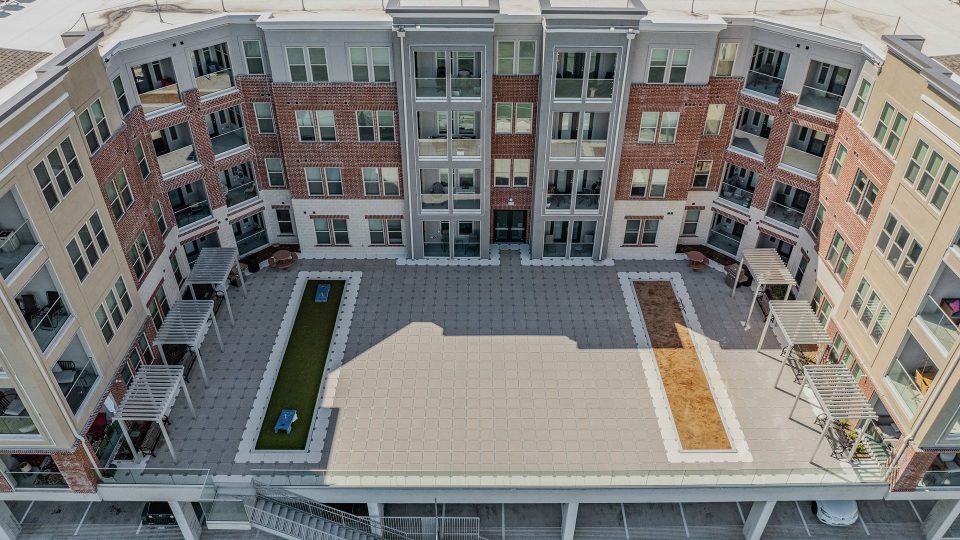 an aerial view of a courtyard with a fountain at The  Alexa